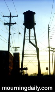 Water Tower And Power Lines